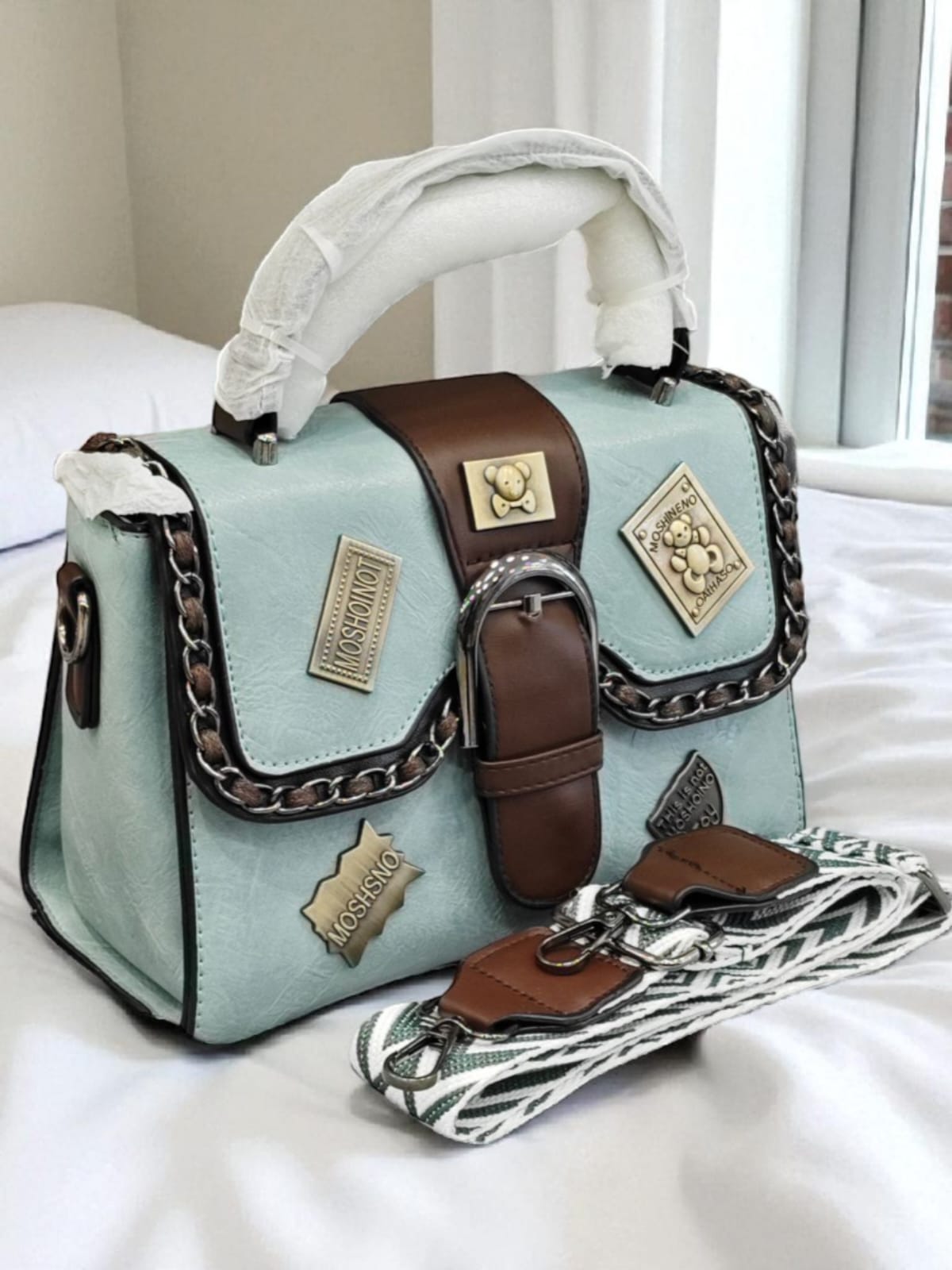 HANDBAG AND SLING BAG