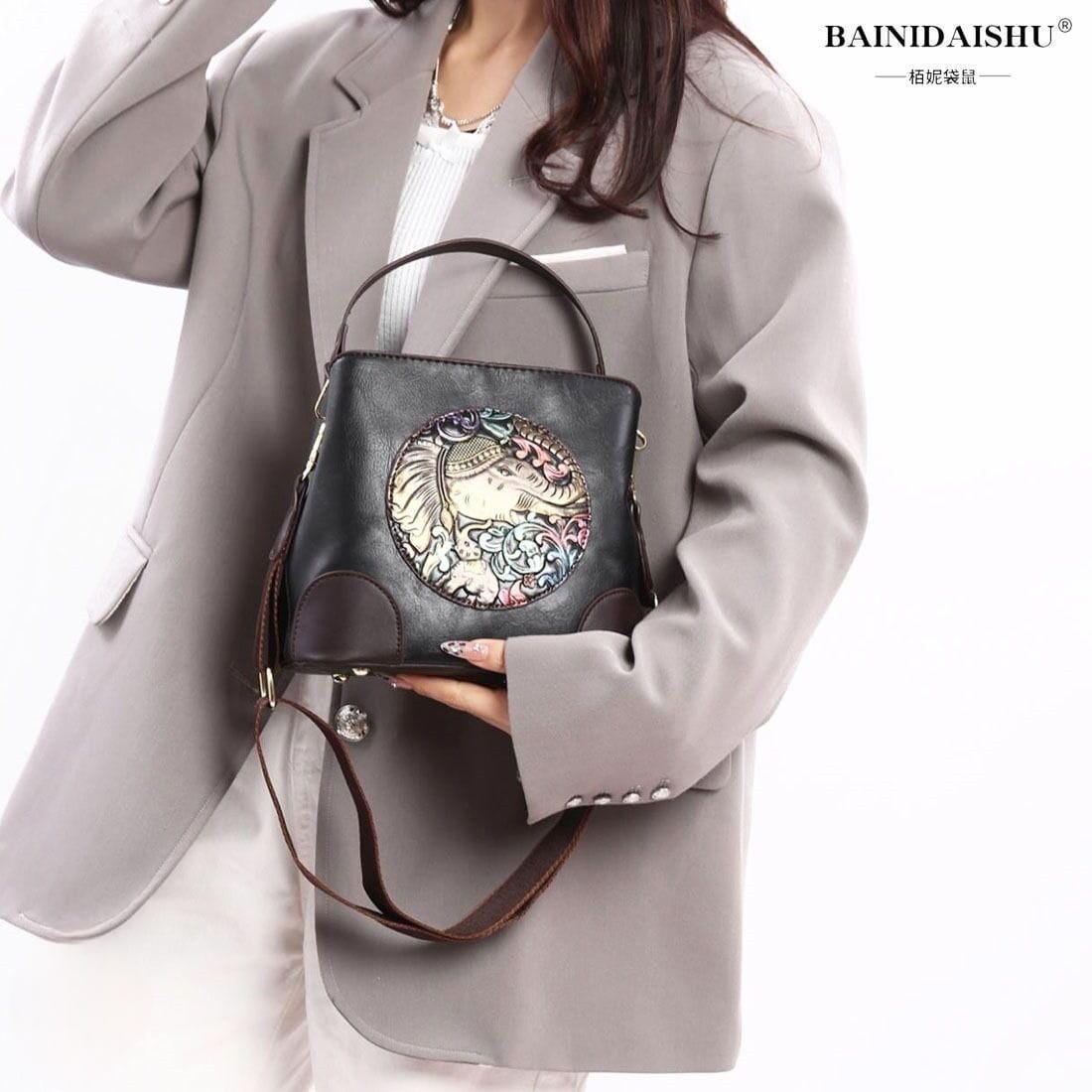 HANDBAG AND SLING BAG